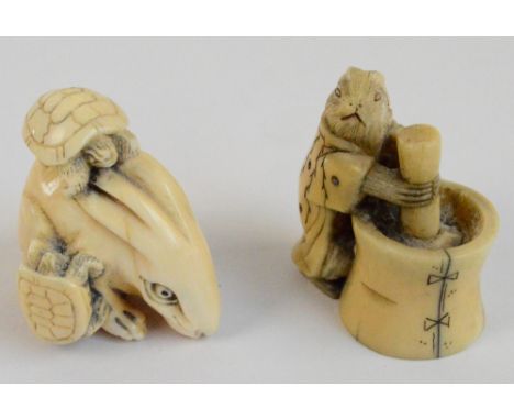 A Japanese Meiji period carved ivory netsuke modelled as a rabbit and two turtles, length 3.6cm, and a small okimono of a rab