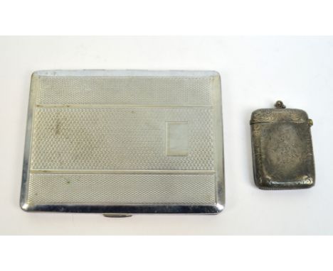 A Victorian hallmarked silver vesta case of rounded rectangular form, overall engraved with foliate scrolls and floral motifs