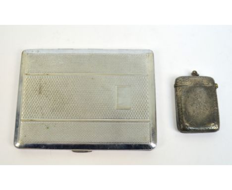 A Victorian hallmarked silver vesta case of rounded rectangular form, overall engraved with foliate scrolls and floral motifs