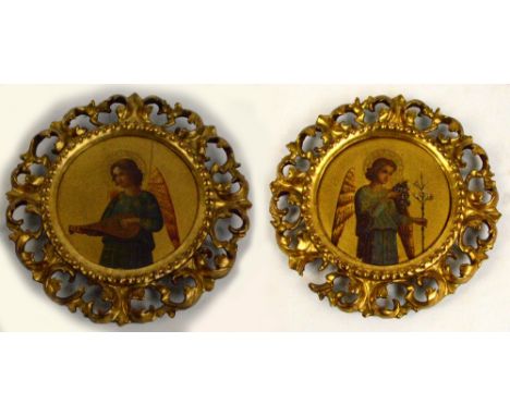 A pair of late 19th century oil on board roundels, Arch Angel Gabriel, and a further angelic figure playing mandolin, diamete
