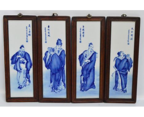 A set of four 20th century Chinese ceramic plaques, each painted in underglaze blue with a figure and with verses of characte