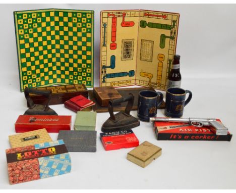 A quantity of collectors' items including a "Spud" gun, a box with a cribbage board in the lid, a Lotto game, a blackboard, c