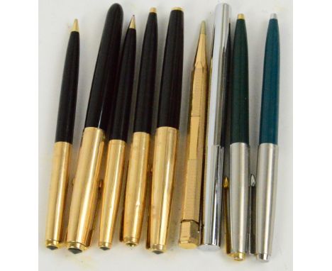 Two Parker fountain pens with gold rolled caps, two matching propelling pencils and a ballpoint pen, two further Parker ballp