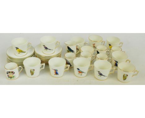 HAMMERSLEY CHINA FOR ROWLAND WARD OF LONDON AND NAIROBI; a bird decorated part tea and coffee set comprising seventeen saucer