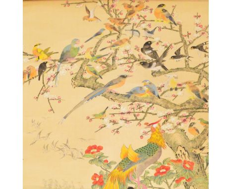 A Chinese gouache and watercolour scroll depicting a phoenix perched on a rock with numerous birds perched on blossoming bran