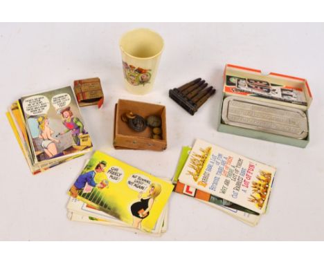 A collection of c.1960s humorous and risqué postcards, a pair of boxed and chrome cased "Rolls Razors" and a matching strop d