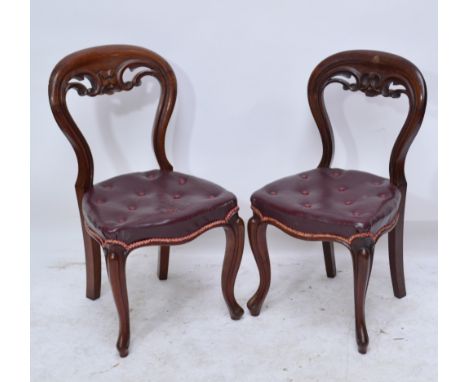 A set of six early Victorian mahogany dining chairs with carved pierced top rail above button upholstered stuffover seat, ser