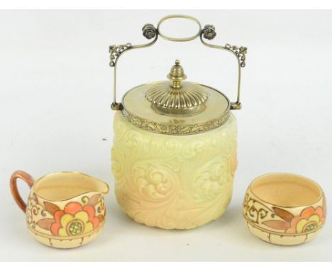 A Locke & Co Ltd blush ivory biscuit barrel with moulded acanthus leaf decoration and with electroplated mounts and cover, he