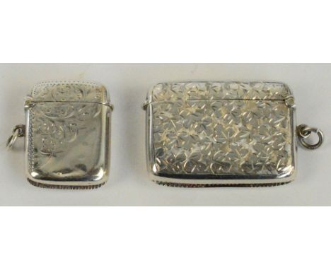 An Edward VII hallmarked silver vesta case of rectangular form with part foliate scroll engraved decoration, inscribed "Joann