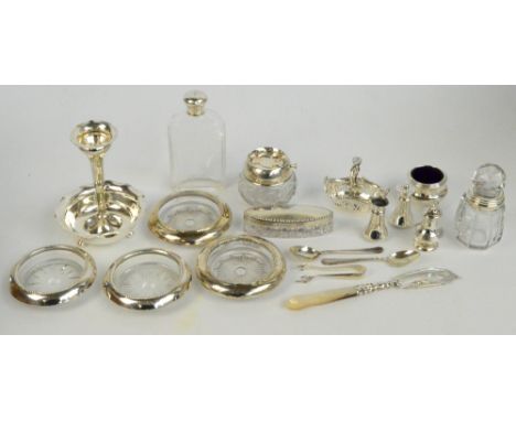 A small collection of silver items including an Edward VII hallmarked silver bowl and vase with fluted rims, Deakin & Francis