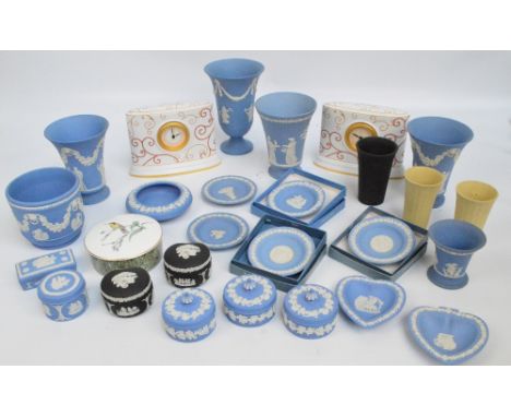 A collection of Wedgwood blue jasperware to include vases, pin dishes, trinket boxes, a flower pot, a pair of black jasperwar