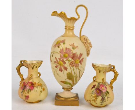 An opposing pair of Royal Worcester blush ivory flower painted jugs, height 11.5cm, with puce mark to base "1507", dated for 