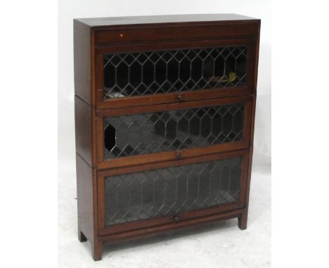 A mahogany Globe Wernicke style three section stacking bookcase with leaded glass doors (af).