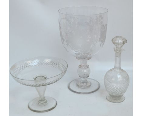 A large Victorian clear glass trophy shaped vase with Victorian coin set into knop, height 37cm, diameter 21.5cm, also a comp