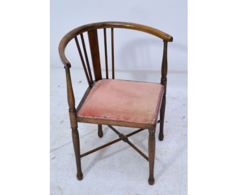 An Edwardian beech corner chair of small dimensions with string inlay, splat back and plain turned legs united by cross stret
