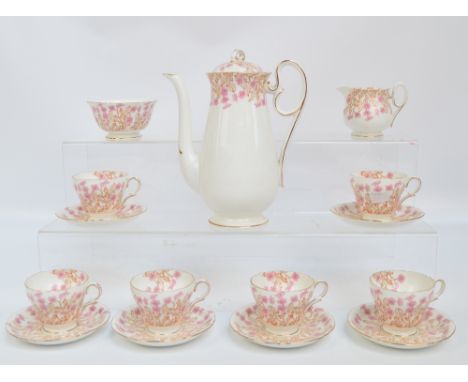 A Shelley floral decorated hedgerow coffee service, pattern no.ZR0189, comprising coffee pot, six cups, six saucers, jug and 