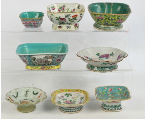 A group of eight Chinese porcelain footed bowls to include four turquoise glazed examples each painted in enamels with variou