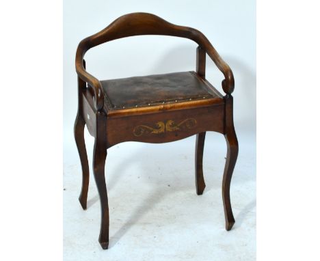 A 20th century beech leather upholstered piano stool with low back and scrolling front, on four cabriole legs, 48 x 32cm.