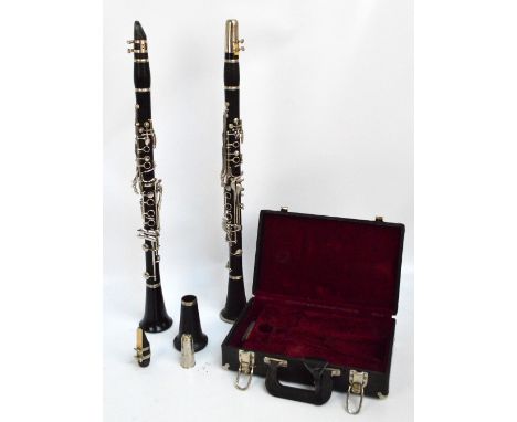 A cased Intermusic clarinet and a loose ebonised clarinet with replacement bell end (2).