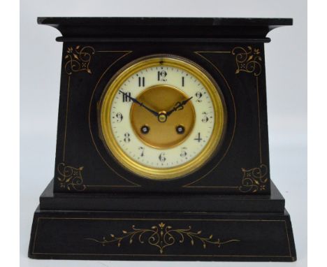A late 19th century French black slate mantel clock with Arabic numerals to the circular chapter ring, width 29cm.