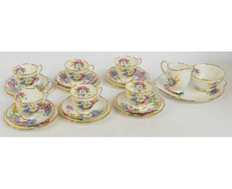 A Royal Albert "Harvest-Bouquet" six setting tea set comprising sandwich plate, jug, bowl, six cups, saucers and side plates.