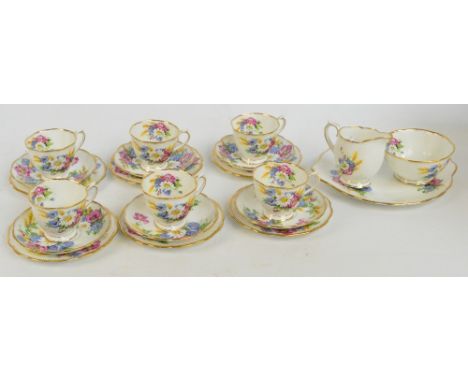 A Royal Albert "Harvest-Bouquet" six setting tea set comprising sandwich plate, jug, bowl, six cups, saucers and side plates.