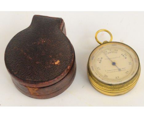 A Victorian leather cased combination barometer, compass and thermometer, by T Armstrong and Bro of Manchester, the upper hin