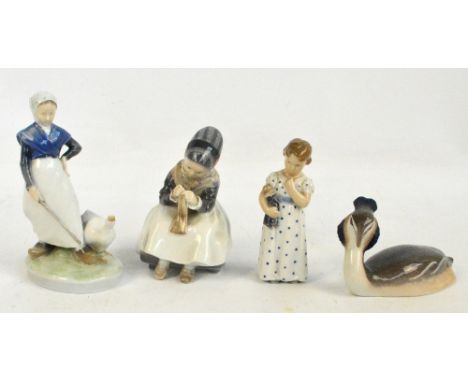 Four Royal Copenhagen porcelain figures, a girl with a goose beside, a duck, a girl with a puppet and a girl sewing (4). COND