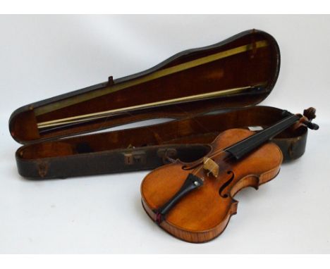 A full sized German violin, Guarneri copy, with two-piece back, length 35.5cm, unlabelled, cased with two bows.