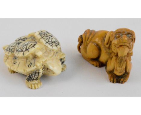 A Japanese Meiji period carved ivory netsuke modelled as a Chi Chi, length 5cm, and a further Japanese netsuke modelled as a 