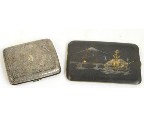 A Japanese Komai cigarette case of rounded rectangular form decorated with a river architectural landscape with Mount Fiji in