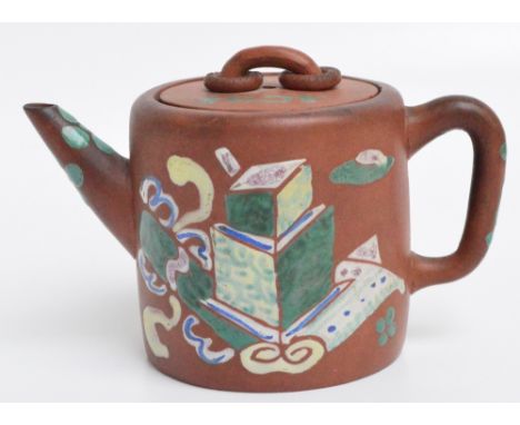 A 19th century Chinese Yixing teapot of cylindrical form, painted in enamels with various objects, with loop ring decorated h