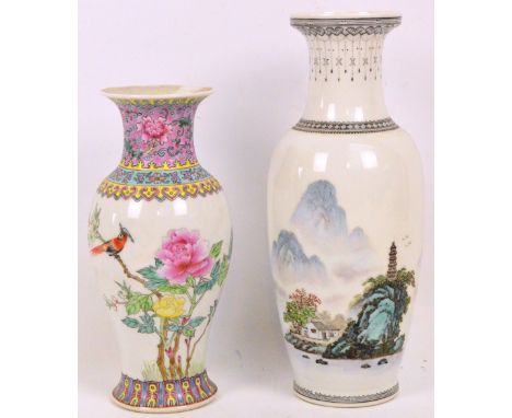 A 20th century Chinese Republic style baluster vase decorated with mountainous and architectural landscape with boats, and wi