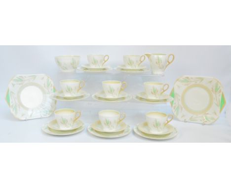 A Shelley leaf decorated tea service, pattern C12458/6, decorated with stylised leaves in shades of pale green and brown on a