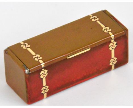 CARTIER; an 800 grade silver gilt and painted enamel trinket box in the form of a casket, the hinged lid revealing the gilt w