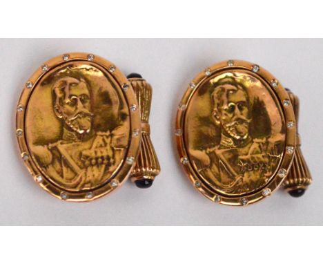 A pair of Russian 14ct yellow gold oval cufflinks with cast portrait of Tsar Nicholas II, within a border set with diamonds a