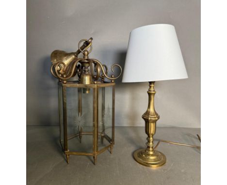 A brass ceiling light with etched glass panels along with a brass tbale lamp 
