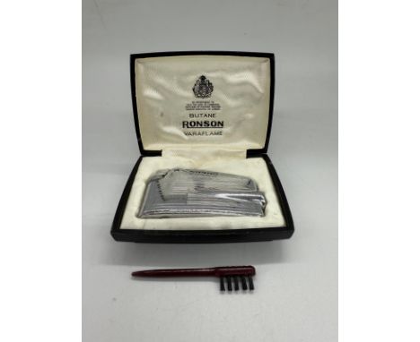 A Ronson Varaflame lighter in original box