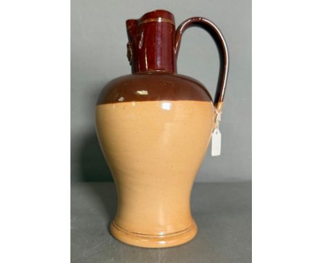 A Royal Doulton Lambeth stoneware pitcher 