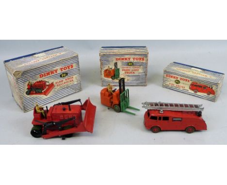 Dinky - Fire engine with extending ladder, No.955, Blaw Knox Bulldozer, No.961 and Coventry Climax Fork Lift Truck, No.401, a