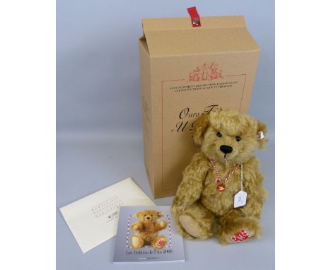 A Steiff limited edition Teddy Bear "U Pitchoun" with growler mechanism, No.1200/2000, 35cm high, boxed with certificate and 