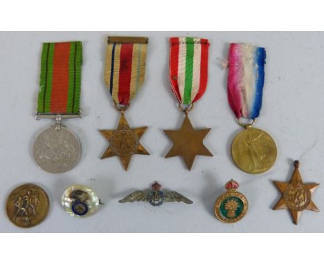 A WWl Victory Medal awarded to Y-183 Pte. H. Baguley  K..R.Rif.C., WWll Defence Medal and three stars for Africa with 8th Arm