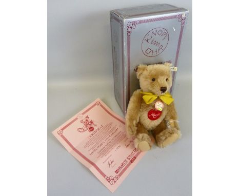 A Steiff limited edition Musical Bear 1951 Caramel 35 No.2216/7000 33cm high in box with certificate