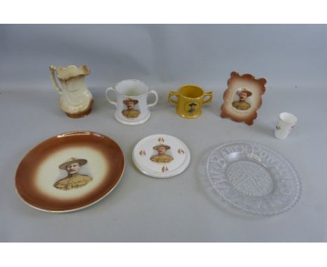 Baden Powell - seven ceramic items comprising circular wall plaque 26cm diameter, milk jug 16cm high, loving cup 11cm high, p