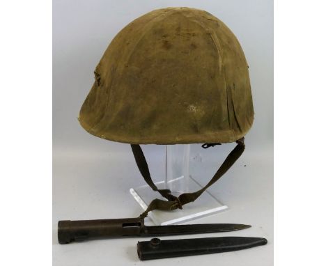 A Falklands War Argentinian helmet, with liner and cover, together with a Belgian FN7162 bayonet and scabbard (2)