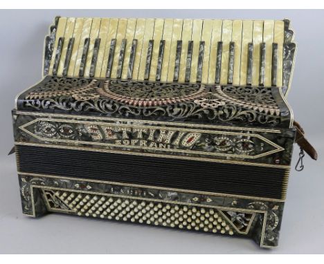 An Italian piano accordion, the grey marbled body with mother-of-pearl style keys, inscribed Settimio Soprani Cardinal, one-h