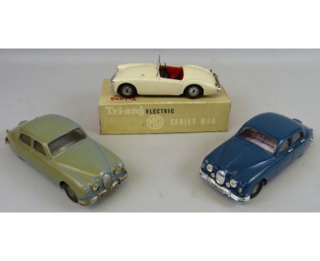 A Tri-ang Electric scale model of an MG MGA sports car, boxed, and two Tri-ang battery operated models of Jaguar cars, both u