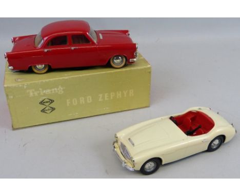 A Tri-ang Minic Electric scale Model of a Ford Zephyr, boxed, and a Tri-ang battery operated Austin Healey 3L sports car, unb