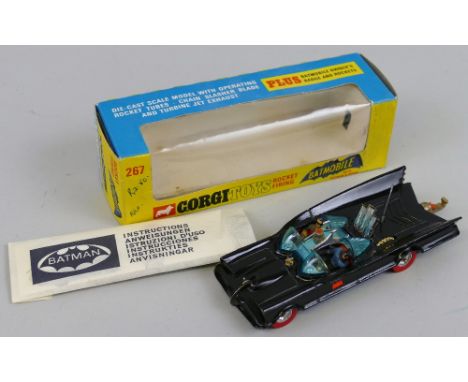 Corgi - Batmobile, No.267, with towing hook, in blue and yellow window box with secret instructions, twelve spare rockets att