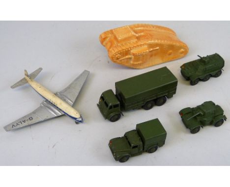 Dinky - four unboxed army vehicles comprising 10-ton Army Truck, No.622, Army 1-ton Cargo truck, No.641, Armoured Personnel C